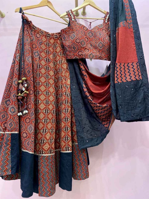 Rust Ajrakh with sleeveless blouse